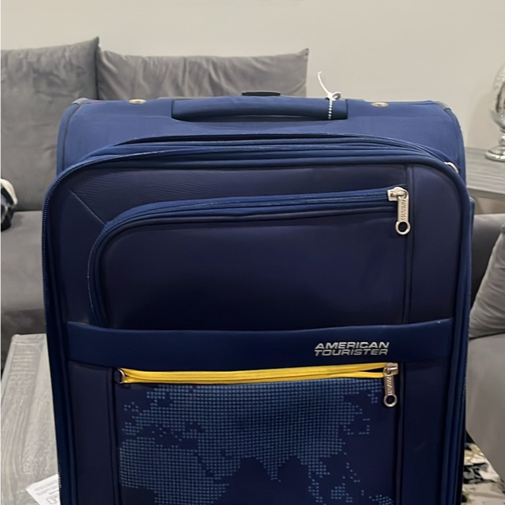American Tourister Dark Blue Travel Bag with Yellow Accents